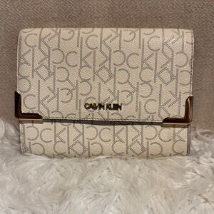 Calvin Klein Beige Monogram Clutch
